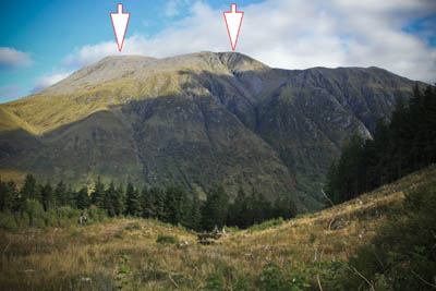 Ben Nevis seen from the South. The left arrow shows Carn Dearg (NW) and the right arrow the summit of the Ben
