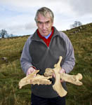 Ingleborough Archaeology Group chairman David Johnson with some of the bones 