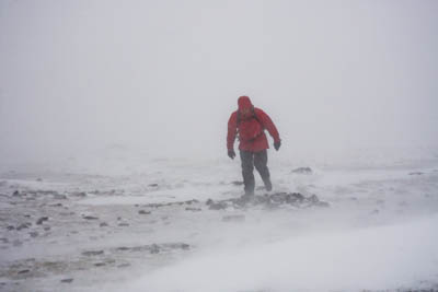 A winter hillwalker tackles blizzard conditions