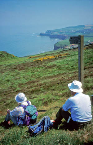 Walkers on the coastal section of the Cleveland Way