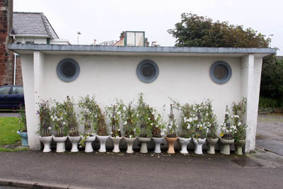 The toilet block at St Bees, complete with a row of planted toilet pans