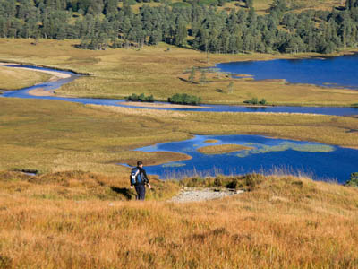 A walker approaches Loch Tulla in Argyll