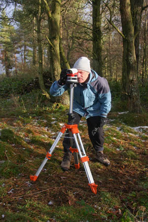 John Barnard surveying with the level on the summit of Mynydd y Cwm