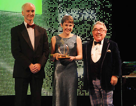 Helen Webster, co-founder of Walkhighlands being presented with the Thistle award by comedian Ronnie Corbett and Eddie Brogan from Scottish Enterprise