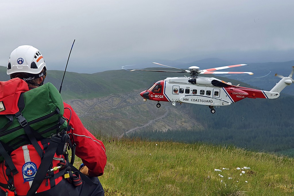 A team member waits to be airlifted to the incident site. Photo: Aberdyfi SRT