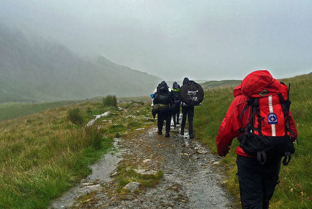 Rescuers accompany the lost walkers to safety. Photo: Aberdyfi SRT Rescuers accompany the lost walkers to safety. Photo: Aberdyfi SRT