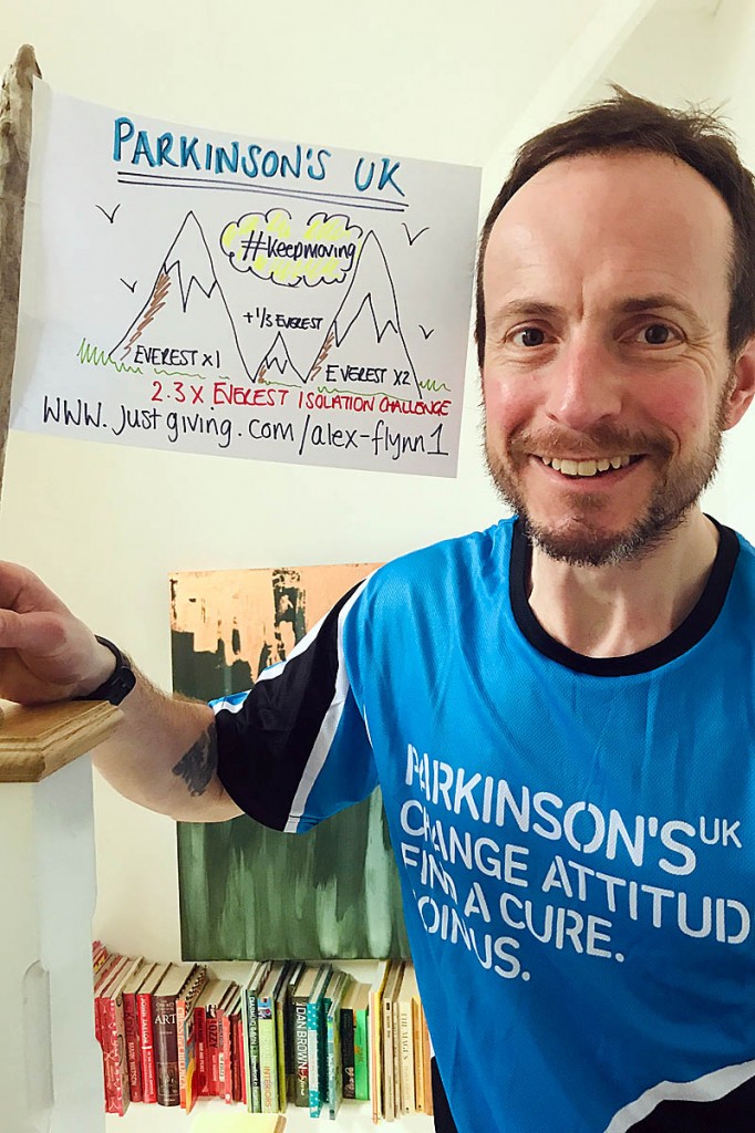 Alex Flynn celebrates his double vertical marathon achievement