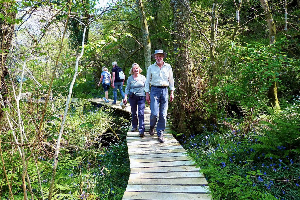 Walkers on the Arran Coastal Trail Walkers on the Arran Coastal Trail