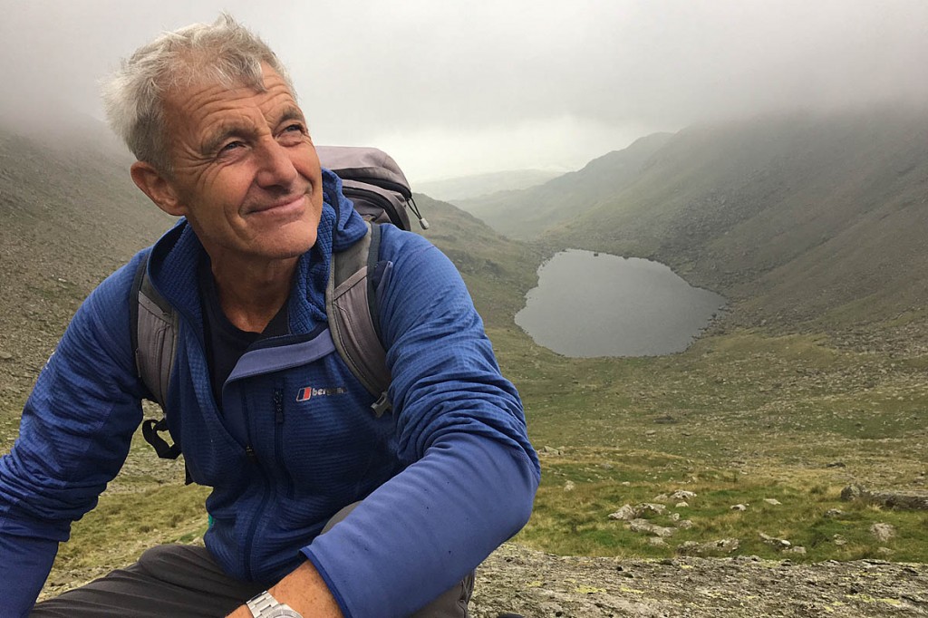 Paul Rose takes a break above Goats Water on his ascent of The Old Man of Coniston. Photo: BBC