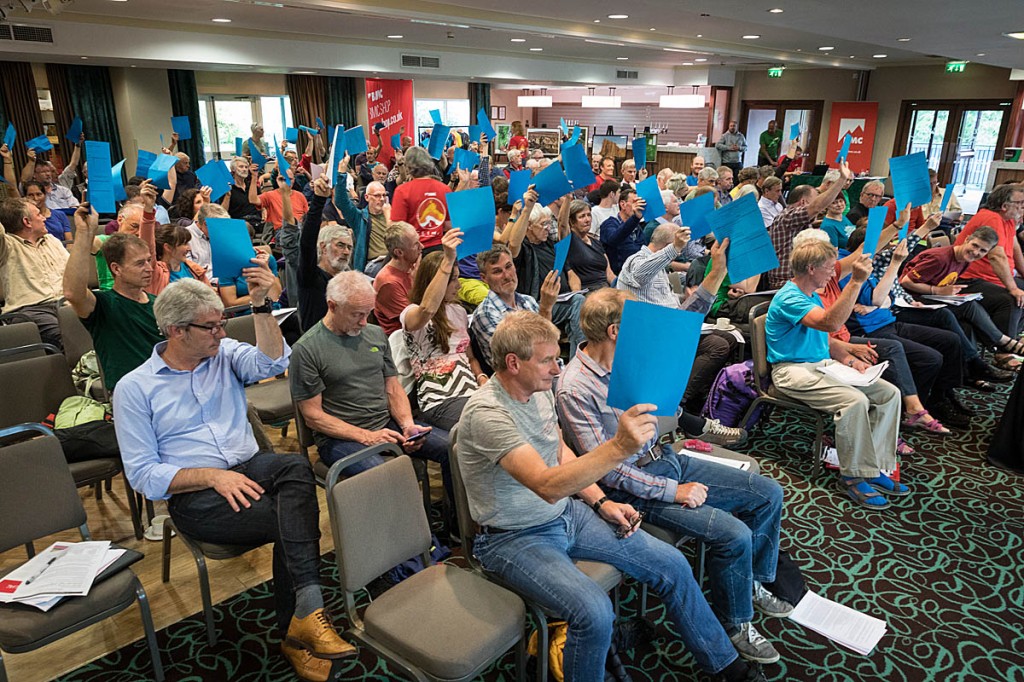 Members vote during the meeting. Photo: Bob Smith/grough Members vote during the meeting. Photo: Bob Smith/grough