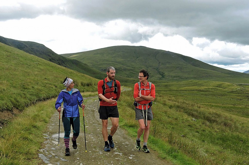 Sabrina Verjee discusses routes with Paul Tierney, centre, and Steve Birkinshaw after summiting Clough Head