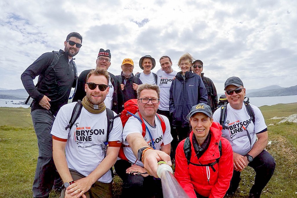 Bill Bryson, back, third from left, joins the walkers at Cape Wrath