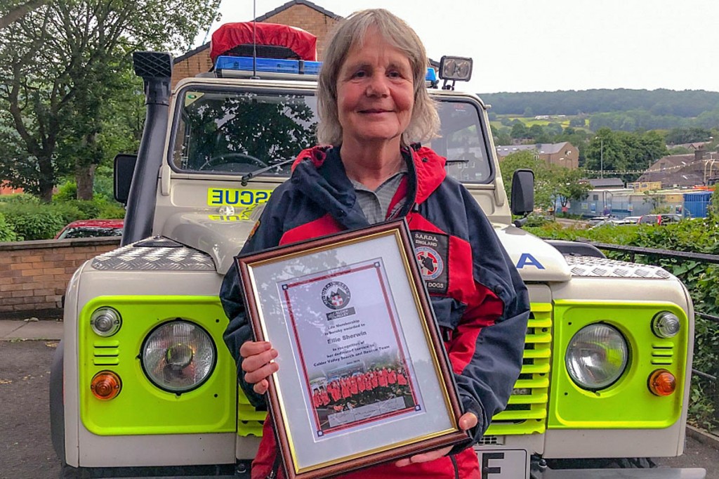 Ellie Sherwin displays her award Ellie Sherwin displays her award