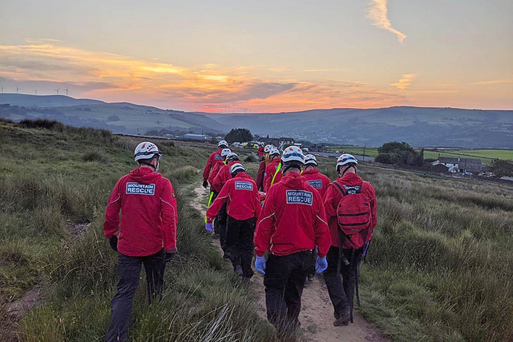 Team members stretcher a casualty from Jail Hole. Photo: CVSRT Team members stretcher a casualty from Jail Hole. Photo: CVSRT