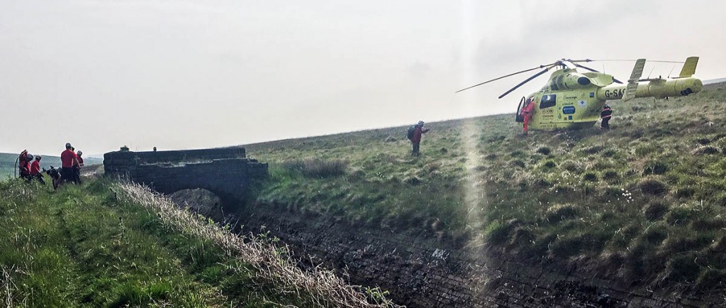 Team members and the Yorkshire Air Ambulance at the day's first incident. Photo: CVSRT Team members and the Yorkshire Air Ambulance at the day's first incident. Photo: CVSRT