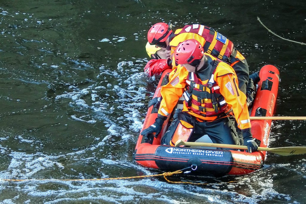 Team members practise with the Northern Diver rescue sled. Photo: Calder Valley SRT Team members practise with the Northern Diver rescue sled. Photo: Calder Valley SRT