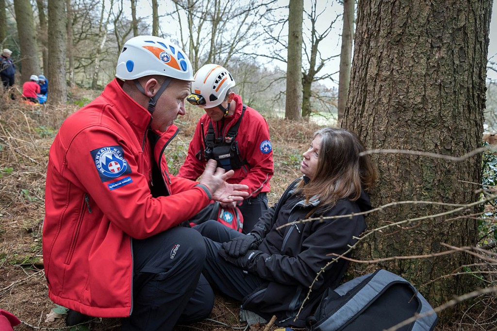 Team members with a 'casualty' during training. Photo: Bob Smith/grough Team members with a 'casualty' during training. Photo: Bob Smith/grough