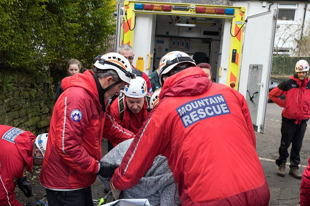 The injured walker is put into the ambulance. Photo: Bob Smith/grough The injured walker is put into the ambulance. Photo: Bob Smith/grough