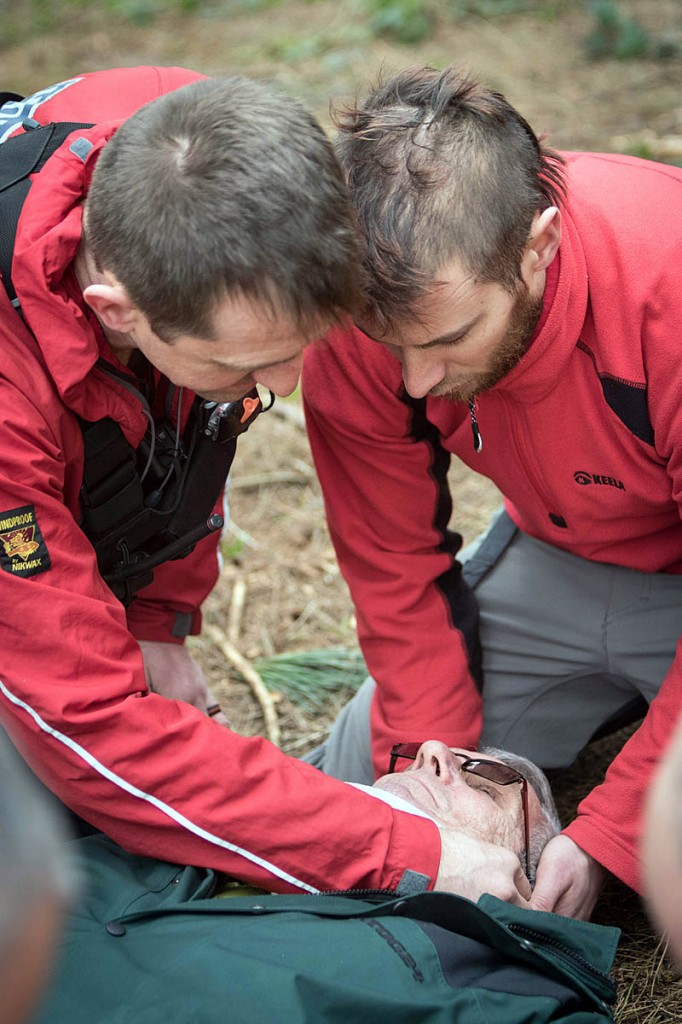 Team members practise 'packaging' a casualty. Photo: Bob Smith/grough Team members practise 'packaging' a casualty. Photo: Bob Smith/grough