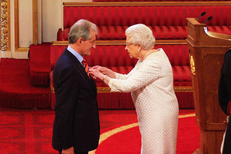 Christopher Pennell receives his MBE from the Queen Christopher Pennell receives his MBE from the Queen
