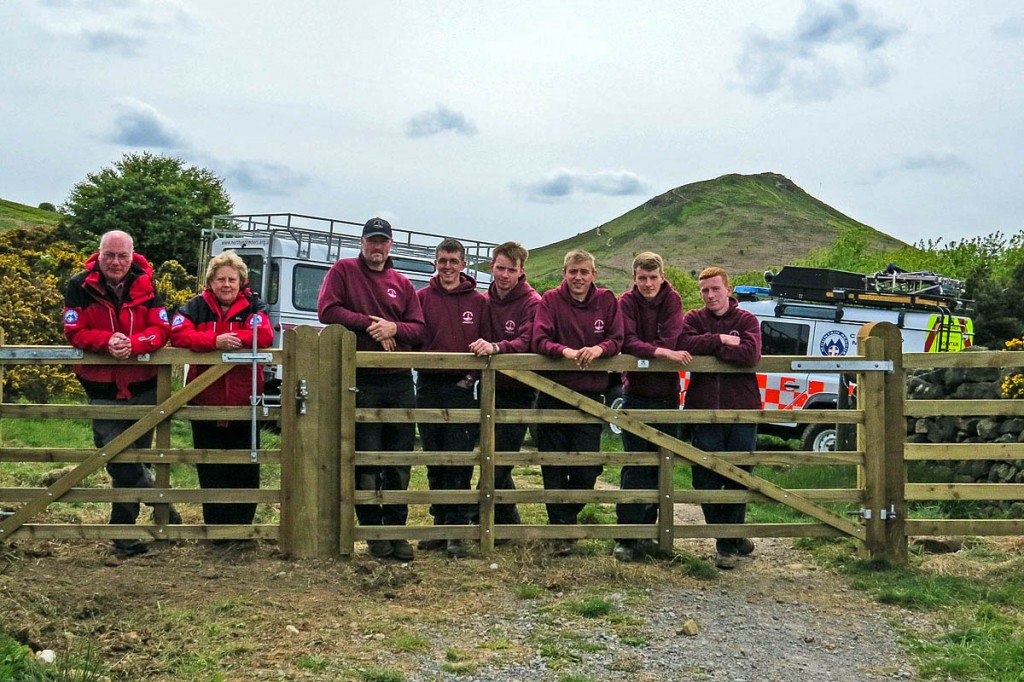 Rescuers and national park staff at one of the gates, with Roseberry Topping in the distance. Photo: Martin Codd/Cleveland MRT