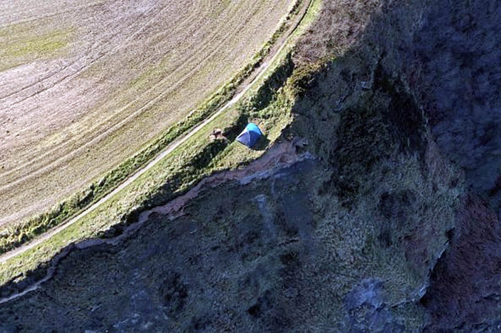 The tent was pitched just feet away from the cliff edge. Photo: Alastair Smith/HM Coastguard
