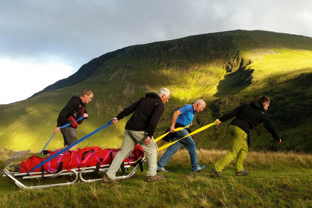 The injured walker is stretchered from the fell. Photo: Cockermouth MRT The injured walker is stretchered from the fell. Photo: Cockermouth MRT