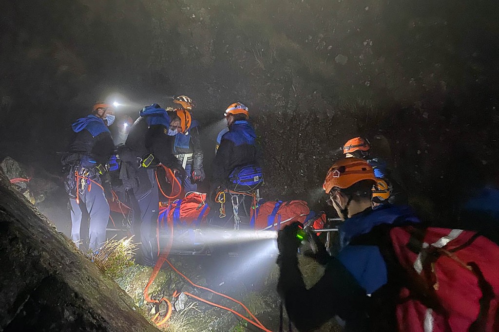 Team members tend to the injured walker. Photo: Cockermouth MRT