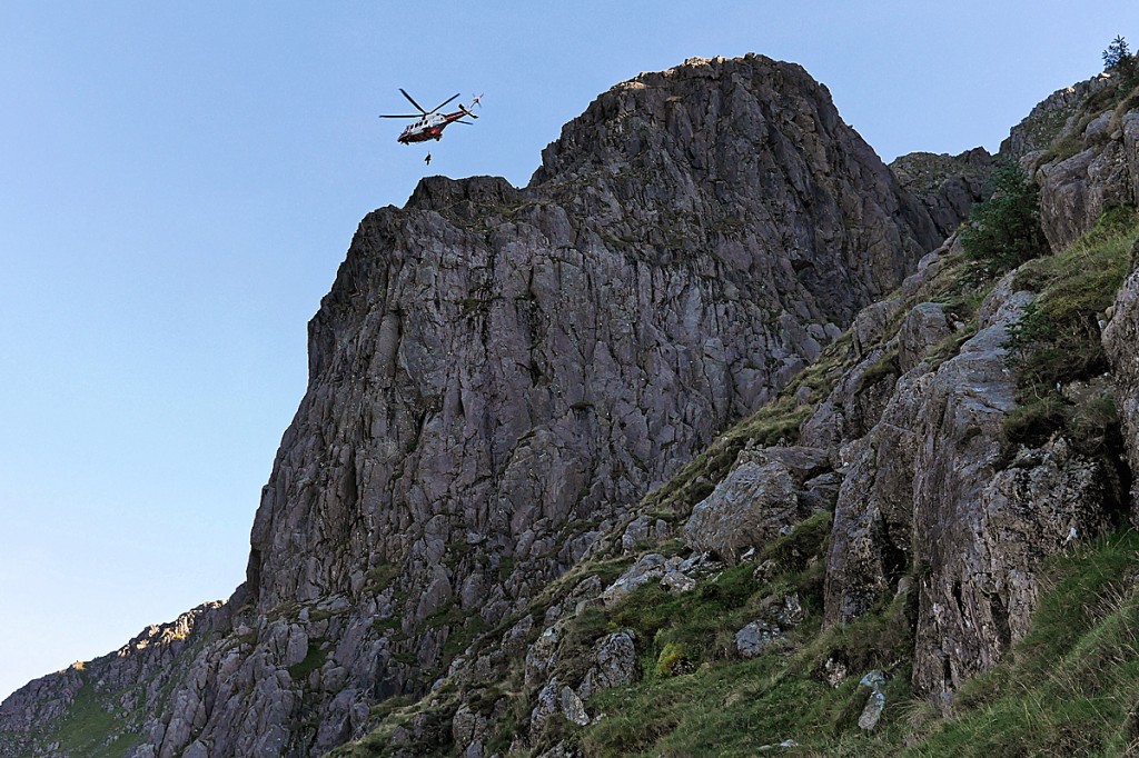 The Coastguard helicopter above the crag at Pillar Rock. Photo: Cockermouth MRT