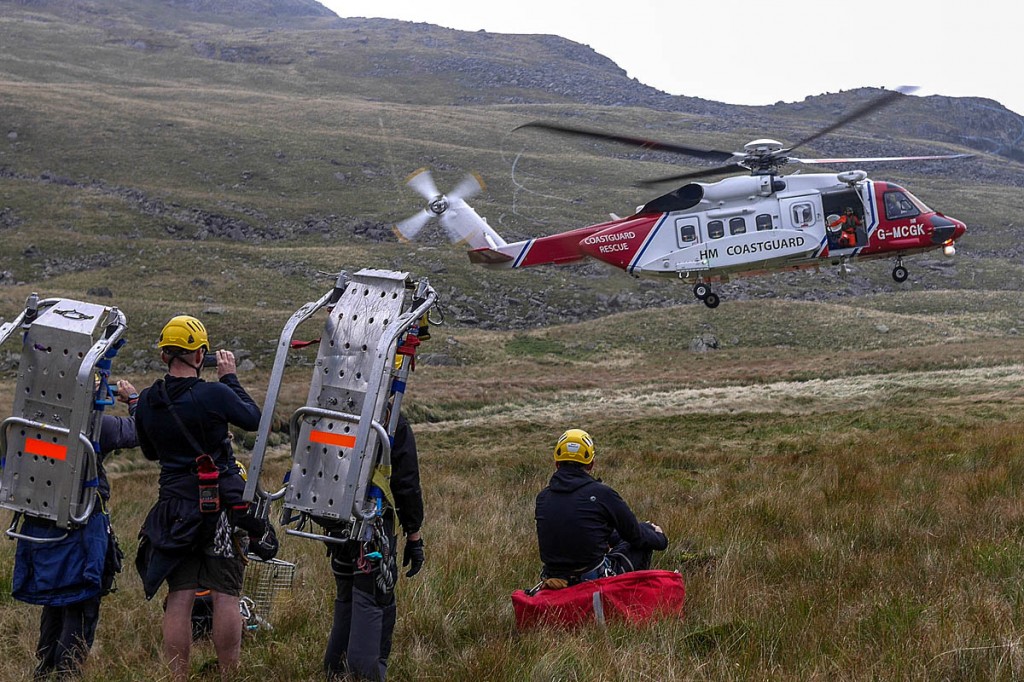 Rescuers at the scene with the Coastguard helicopter. Photo: Cockermouth MRT