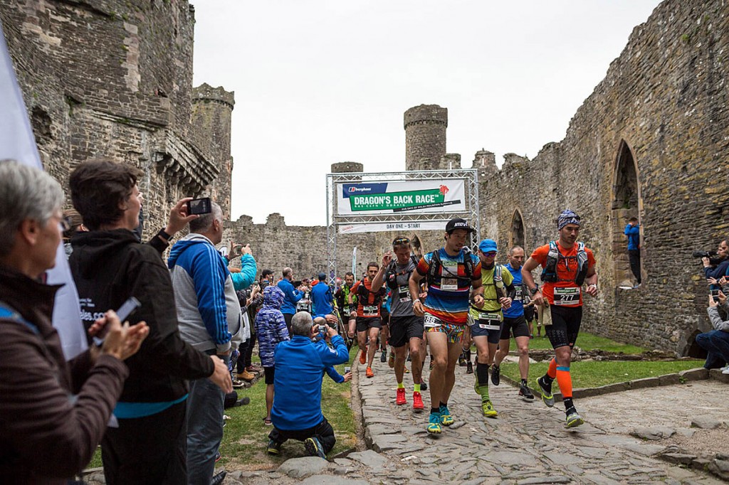 Runners leave Conwy Castle at the start of the race Runners leave Conwy Castle at the start of the race