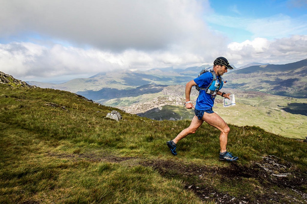Jim Mann strides across the Welsh mountains during the race. Photo: Ian Corless