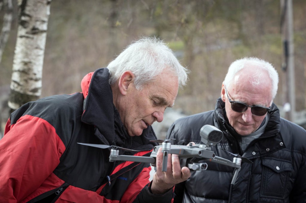 Richard Warren shows a drone to masonic lodge members during a training exercise in the Lake District. Photo: Bob Smith/grough