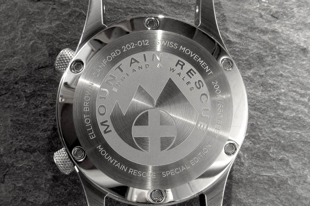 The watch has the mountain rescue logo on its case back