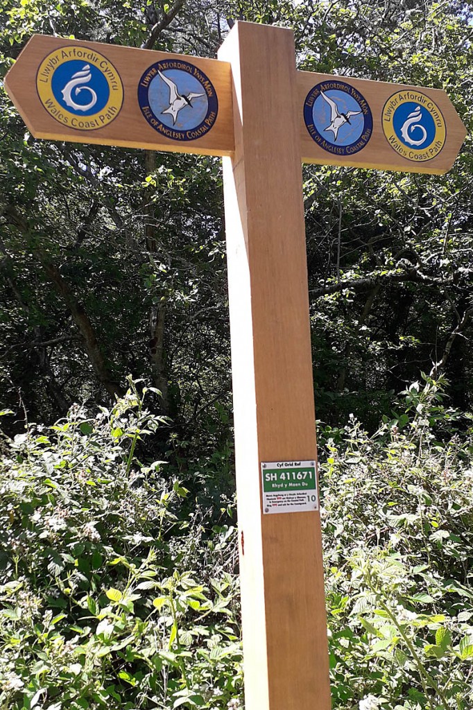 One of the plaques attached to a coastal path finger post