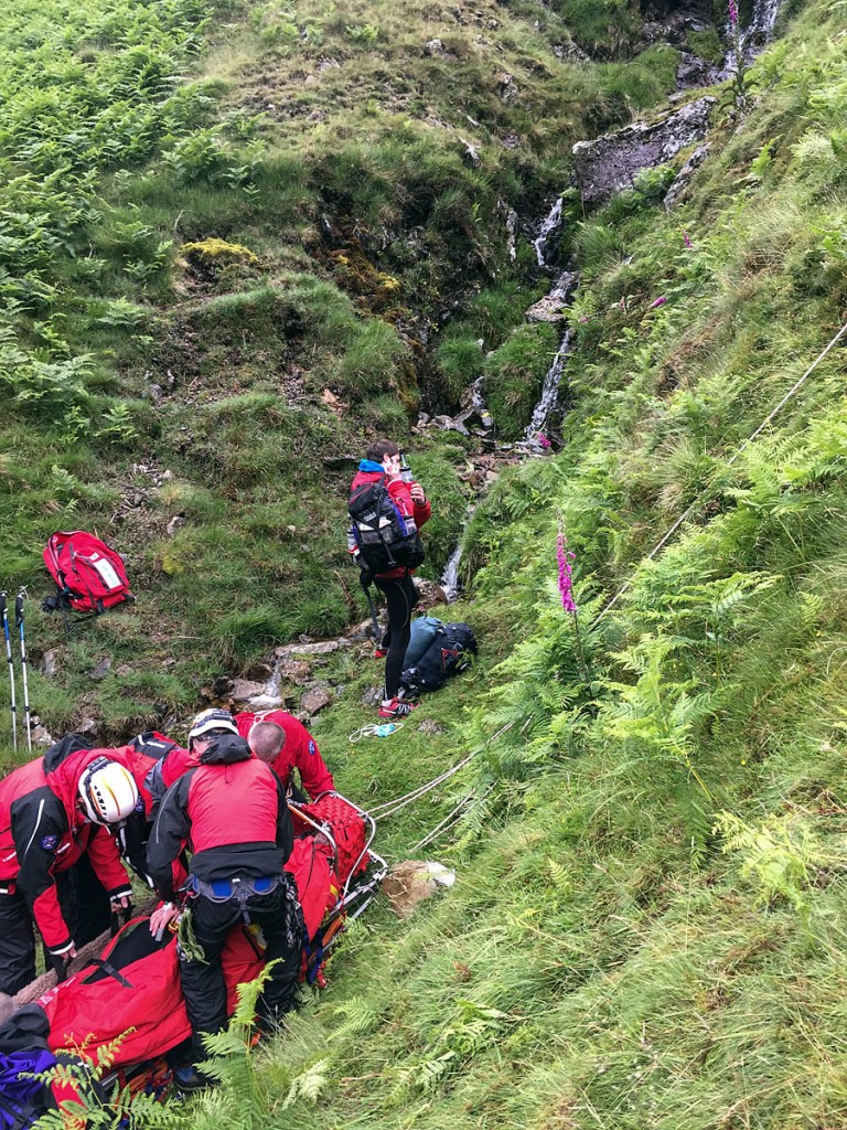 Rescuers at the scene of the incident in the gill on Angletarn Pikes. Photo: GNAAS Rescuers at the scene of the incident in the gill on Angletarn Pikes. Photo: GNAAS