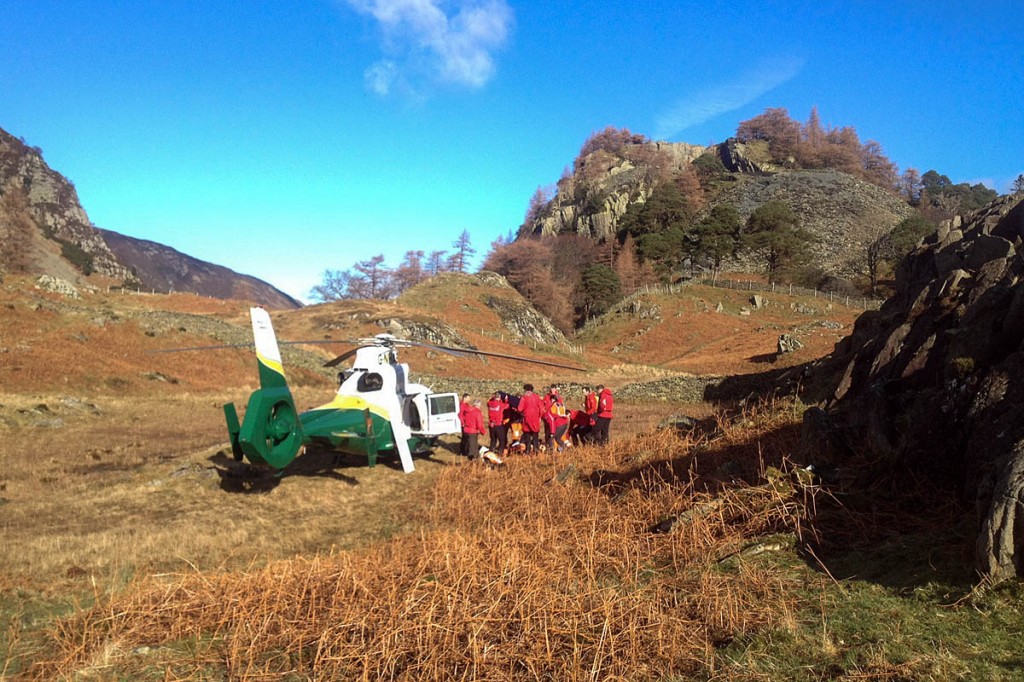Rescuers and air ambulance crew at the scene on Castle Crag. Photo: GNAAS Rescuers and air ambulance crew at the scene on Castle Crag. Photo: GNAAS