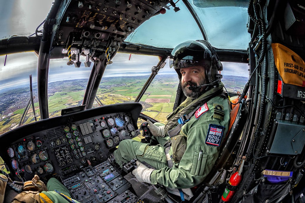 Lieutenant Commander Charlie Fuller at the controls of the Sea King. Photo: Royal Navy Lieutenant Commander Charlie Fuller at the controls of the Sea King. Photo: Royal Navy