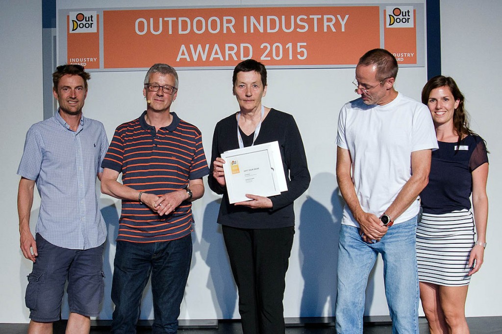Sarah Howcroft, centre, receives the award at the OutDoor show