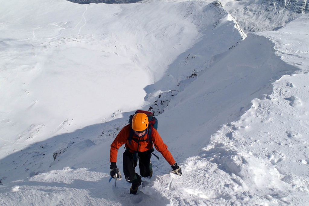 A winter climber tops out on Helvellyn