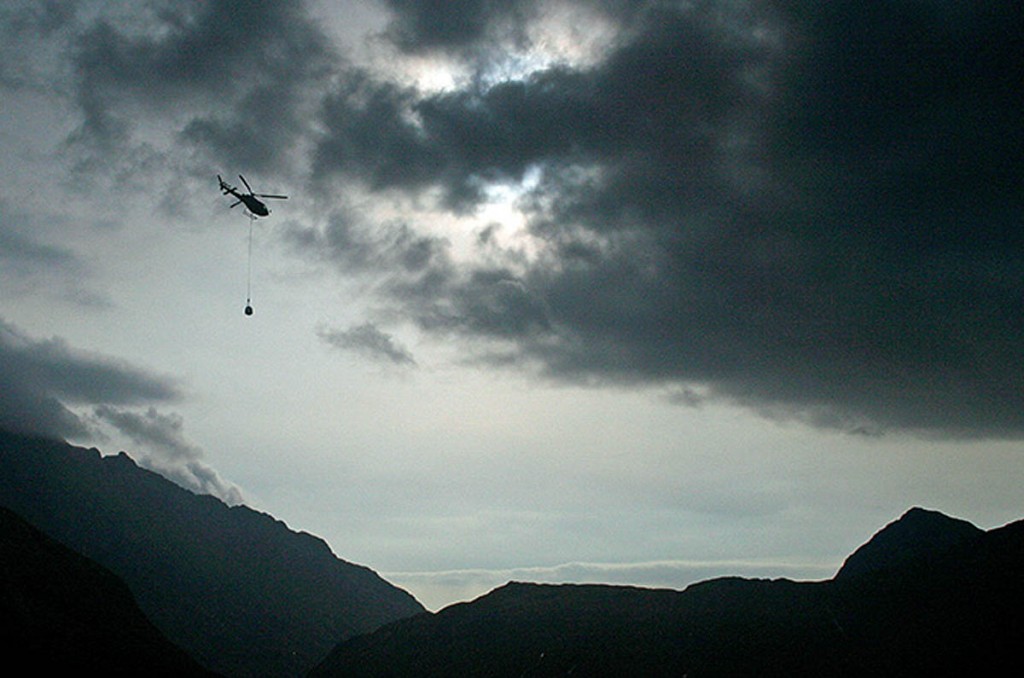 A helicopter lift during previous work on the Drum Hain path A helicopter lift during previous work on the Drum Hain path