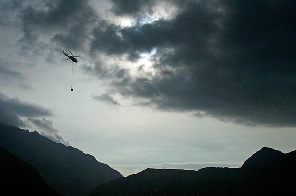 A helicopter lift during previous work on the Drum Hain path
