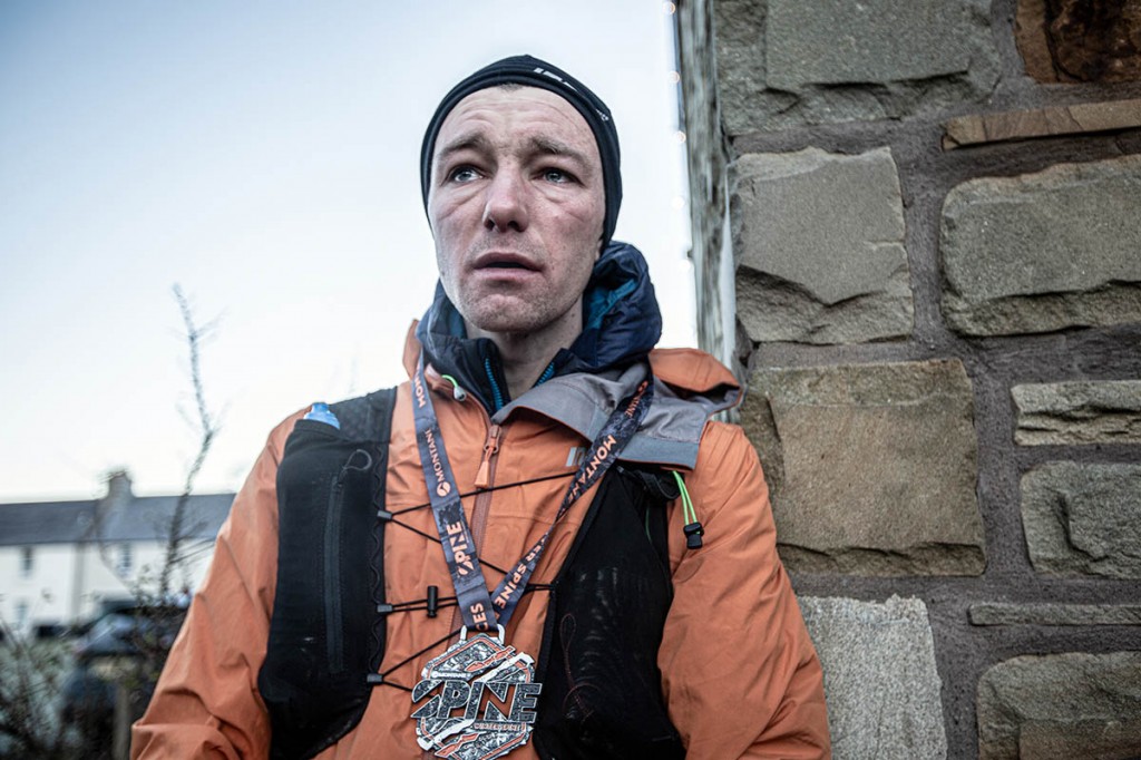 Jack Scott at the finish at Kirk Yetholm. Photo: Adam Wild Aperture