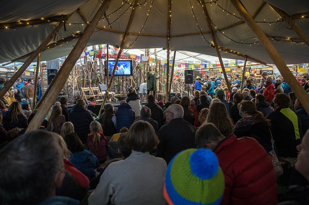 Crowds listen to a speaker on the Yeti Stage in the Basecamp. Photo: Bob Smith/grough
