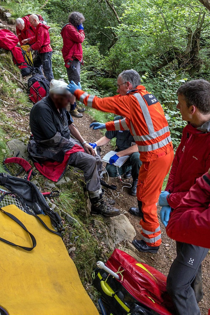 The injured walker is treated in the gill. Photo: Keswick MRT The injured walker is treated in the gill. Photo: Keswick MRT