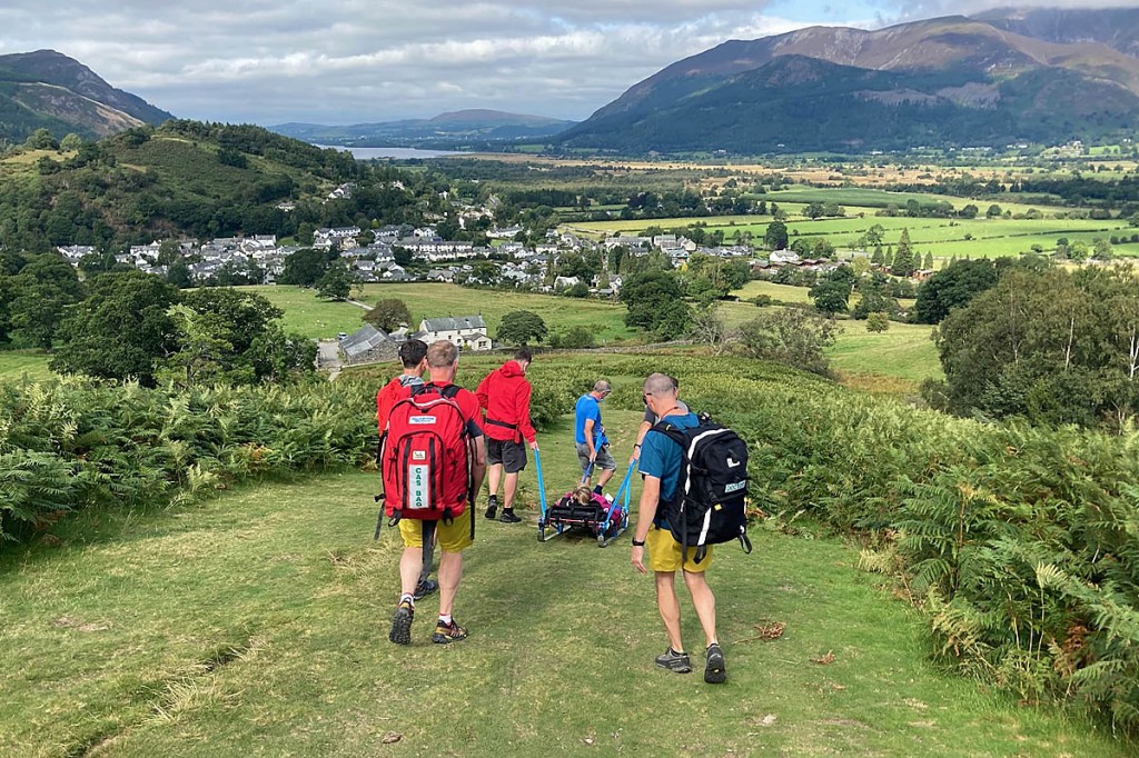 The injured walker is stretchered from Barrow. Photo: Keswick MRT The injured walker is stretchered from Barrow. Photo: Keswick MRT