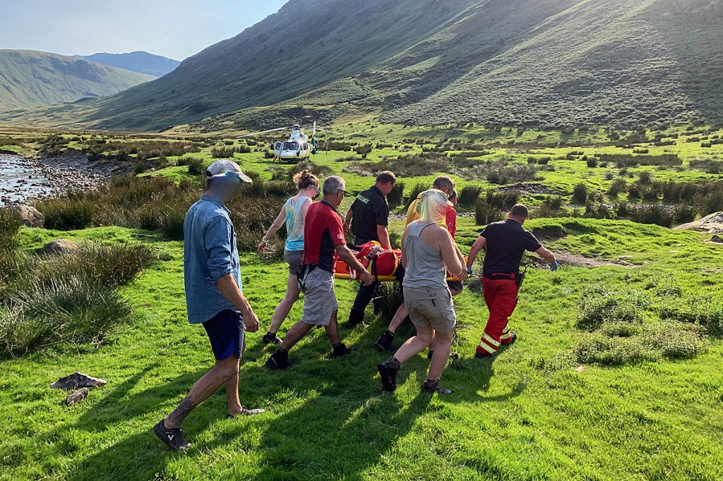 The injured girl is stretchered to the air ambulance. Photo: Keswick MRT