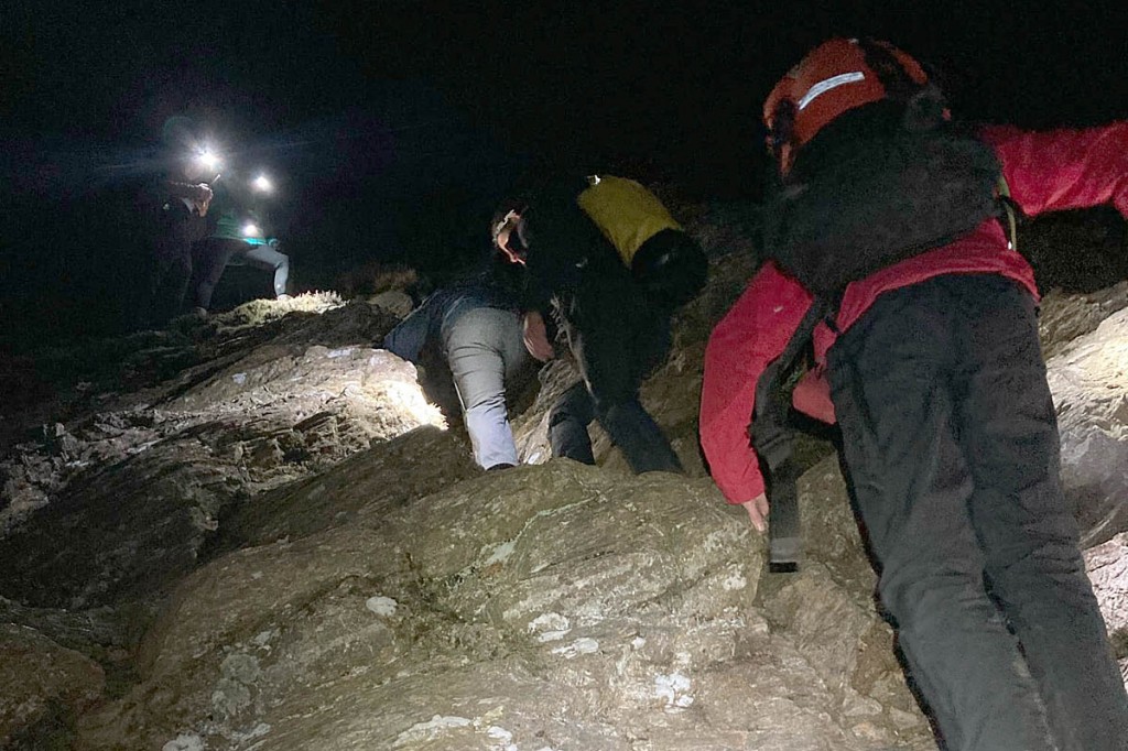Rescuers helped the two walkers who had strayed onto difficult ground. Photo: Keswick MRT Rescuers helped the two walkers who had strayed onto difficult ground. Photo: Keswick MRT