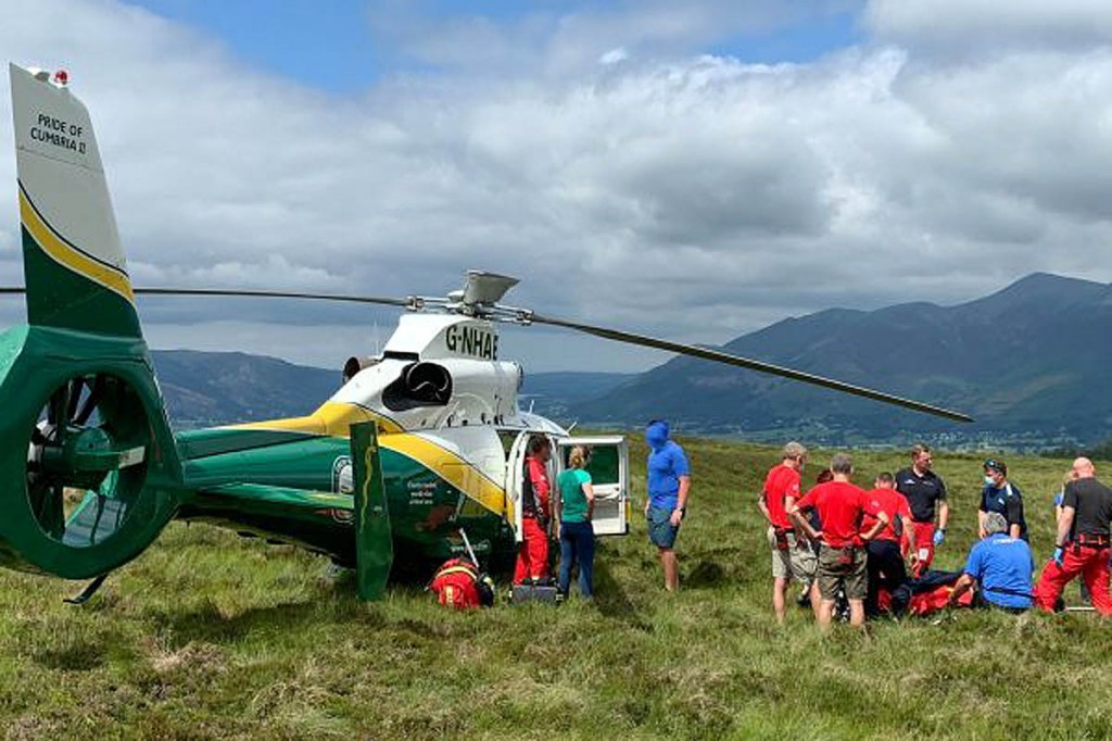 Rescuers with the air ambulance on Bleaberry Fell. Photo: Keswick MRT Rescuers with the air ambulance on Bleaberry Fell. Photo: Keswick MRT