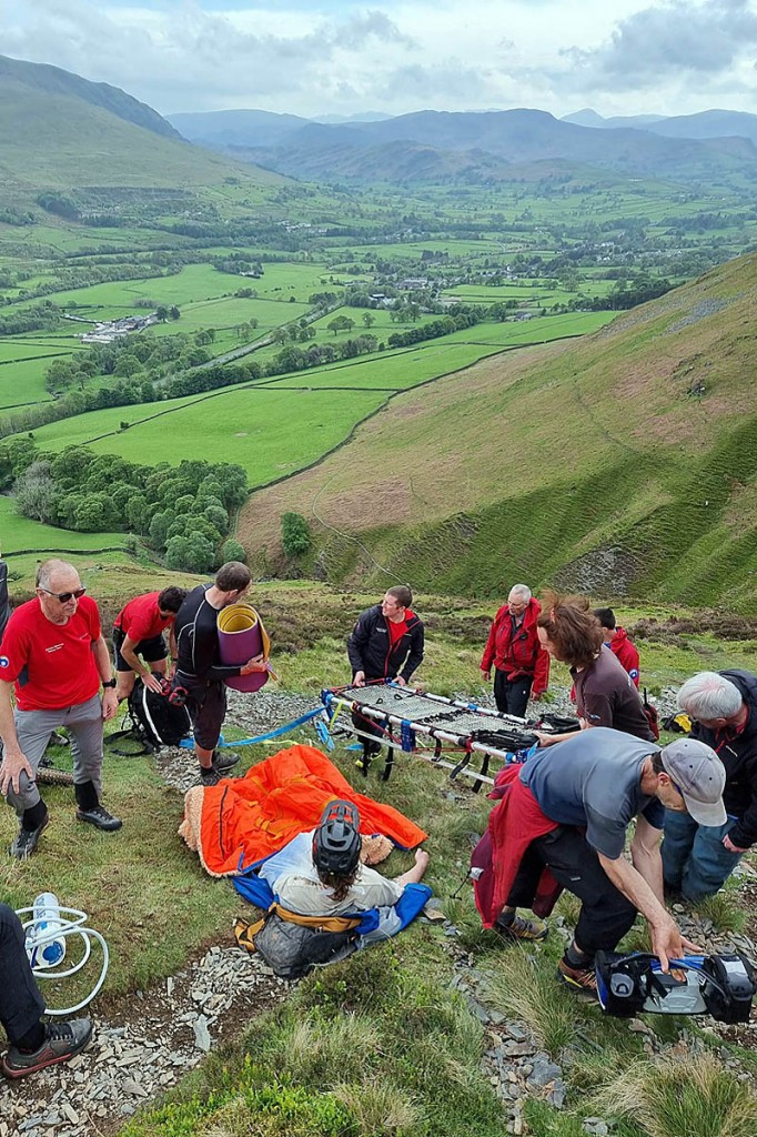 Rescuers tend to the injured mountain biker. Photo: Keswick MRT Rescuers tend to the injured mountain biker. Photo: Keswick MRT
